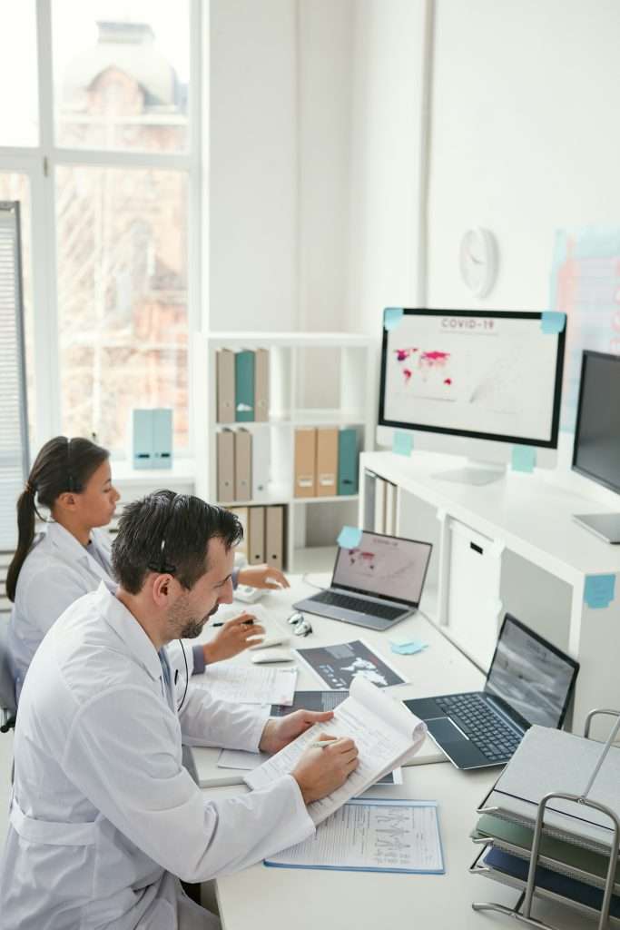 Doctors working at the table