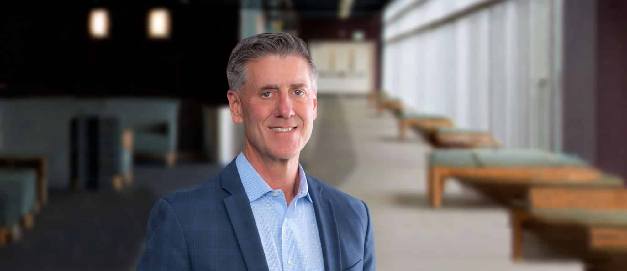 Picture of Contexture Board Member and UCHealth CIO Steve Hess over office background